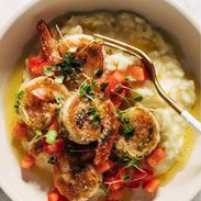Pesto shrimp and parmesan risotto in a bowl pin